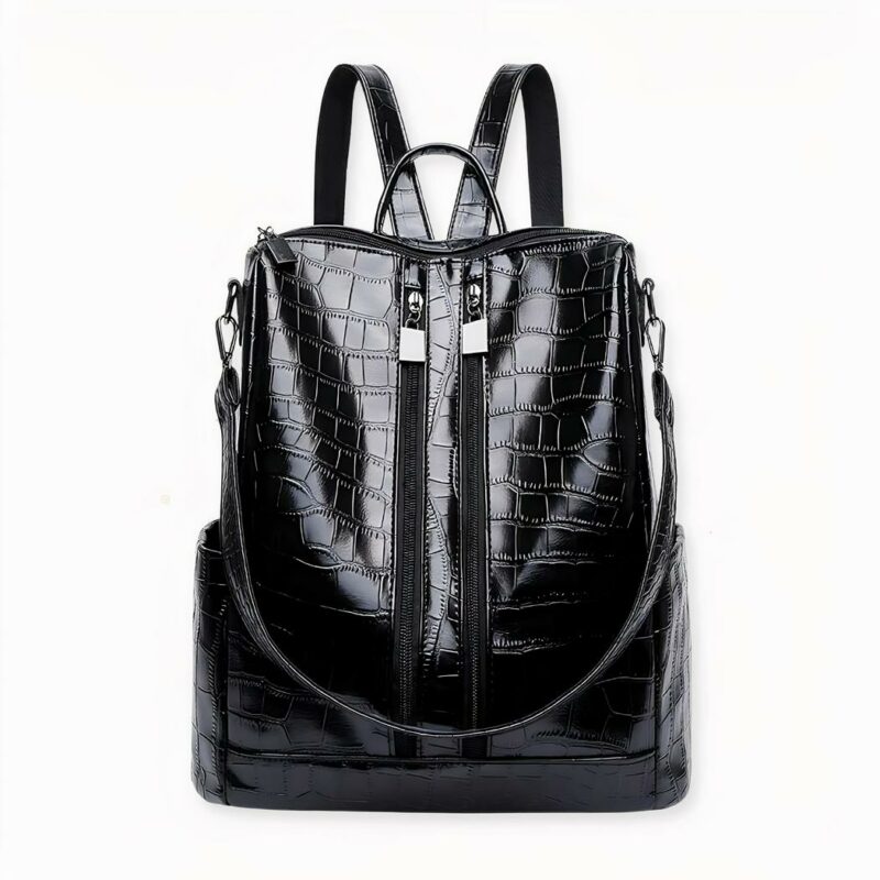 Descubra esta mochila de estilo urbano, que le conquistará por su practicidad y su estilo elegante. Fabricada en imitación de piel con estampado de cocodrilo, aportará un toque de moda a sus conjuntos. Su capacidad le permitirá llevar siempre consigo sus imprescindibles diarios.