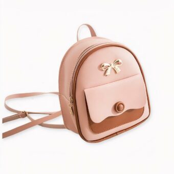 mini mochila multifuncional en rosa y marrón sobre fondo gris claro.