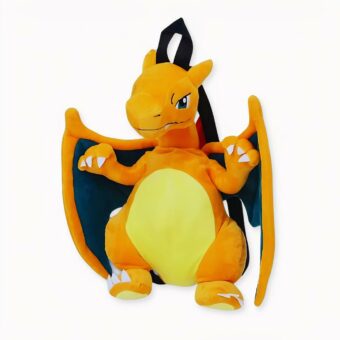 Peluche pokemon dragón amarillo con alas sobre fondo blanco roto